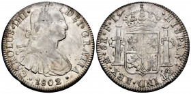 Charles IV (1788-1808). 8 reales. 1802. México. FT. (Cal-975). Ag. 27,06 g. Original luster. Edge defect. Attractive. Almost XF. Est...200,00. 

Spa...