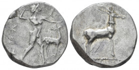 Bruttium, Caulonia Nomos circa 475-425, AR 20.80 mm., 7.99 g.
Apollo standing r., holding branch in r. hand; in field r., stag. Behind, leaf. Rev. St...