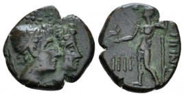 Bruttium, Rhegium Tetras circa 215-150, Æ 15.00 mm., 2.78 g.
Jugate head of Dioskuroi r. Rev. Asklepios standing l. SNG ANS 776. Historia Numorum Ita...
