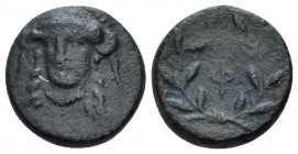 Phocis, Federal coinage Bronze circa 352-351,, Æ 13.00 mm., 2.34 g.
Athena helmeted facing ¾ l. Rev. F in laurel wreath, mostly with berries. BCD Lok...