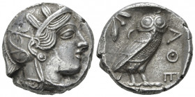 Attica, Athens Tetradrachm after 449 BC, AR 23.70 mm., 17.17 g.
Head of Athena r., wearing Attic helmet decorated with olive wreath and palmettae. Re...
