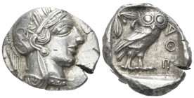 Attica, Attica Tetradrachm After 449 BC, AR 26.70 mm., 17.12 g.
Head of Athena r., wearing Attic helmet decorated with olive leaves and palmette. Rev...