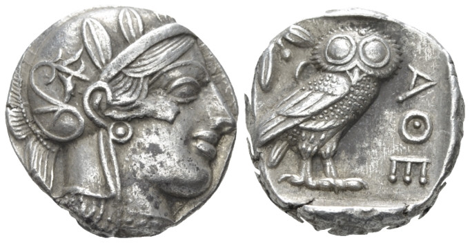 Attica, Tetradrachm circa 405, AR 24.20 mm., 17.16 g.
Head of Athena, wearing c...