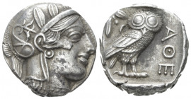 Attica, Tetradrachm circa 405, AR 24.20 mm., 17.16 g.
Head of Athena, wearing crested helmet decorated with olive leaves and spiral palmette. Rev. Ow...