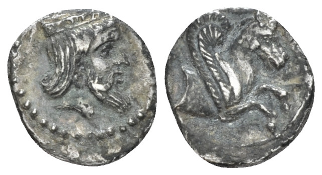Cilicia, Uncertain mint Obol IV century BC, AR 10.00 mm., 0.73 g.
Crowned and b...