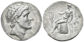 The Seleucid Kings, Antiochus, 266-246 Antioch Tetradrachm circa 256-246, 28.60 mm., 17.00 g.
Diademed head r. Rev. Apollo Delphios seated l. on omph...