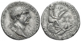 Trajan, 98-117 Tetradrachm Thasos circa 100, AR 25.50 mm., 14.50 g.
Laureate head r. Rev. Tyche seated r. on rock outcropping, holding palm frond; be...