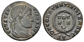 Constantine I, 307-337 Follis Ticinum circa 322, Æ 18.40 mm., 3.38 g.
Laureate head r. Rev. VOT/ XX in two lines within wreath, below crescent; ST. R...