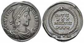 Constantius II, 337-361 Siliqua circa 351-355, AR 20.20 mm., 3.22 g.
Pearl-diademed, draped, and cuirassed bust r. Rev. VOTIS/ XXX/ MVLTIS/ XXXX in f...
