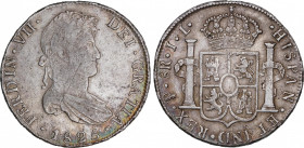 Ferdinand VII (1808-1833)
8 Reales. 1825. POTOSÍ. J.L. 26,84 grs. Sin flores de lis ni granada en escudo. Rayita en anverso. Rara. MBC. / Without fle...