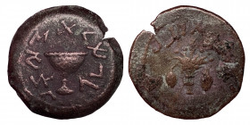 JUDAEA, First Jewish War. 66-70 AD. 1/8 Shekel (Bronze, 4.37 gr, 19 mm), Jerusalem, Year 4 = 69/70. Omer cup. Rev. Bundle of lulav, myrtle and willow ...