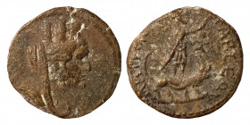 CILICIA, Tarsus. Circa 2nd century AD. Æ (Bronze, 2.39, 17 mm). ΜΗΤΡΟΠΟΛƐΩΝ ΤΑΡϹƐΩΝ, turreted, veiled and draped bust of Tyche right. Rev: Sandan stan...