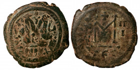 Justinian I, 527-565. Follis, Antioch (ANTIX?), overstruck with Heraclius, 610-641, Follis, Thessalonica. Follis (bronze, 10.88 g, 32 mm). Nearly very...
