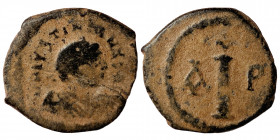Justinian I, 527-565. Decanummium (bronze, 3.55 g, 21 mm). Thessalonica. Obv. D N IVSTINIANVS P AVG diademed, draped and cuirassed bust right. Rev. La...