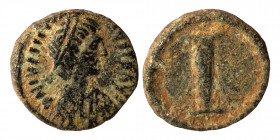 Justinian I. 527-565. Decanummium (bronze, 2.07 g, 13 mm). Salona, struck 552-565. Diademed, draped, and cuirassed bust right. Rev. Large I. DOC 361; ...