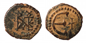 Justin II, 565-578. Pentanummium (Bronze, 1.67 g, 14 mm) Theoupolis (Antioch). Monogram of Justin II. Rev. Large Є; in field to right, cross. DOC 186....