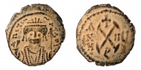 Maurice Tiberius, 582-602. Decanummium (Bronze, 2.21 g, 13 mm) Theoupolis (Antiochia), RY 7 = 588/9. Crowned facing bust of Maurice Tiberius, wearing ...