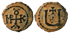 Maurice Tiberius, 582-602. Pentanummium (Bronze, 1.58 g, 15 mm), Theoupolis (Antioch). Monogram of Maurice Tiberius. Rev. Large Ч; above, cross. DOC -...