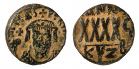 Phocas 602-610. Follis – 40 Nummi (Bronze, 4.30 g, 13.50 mm). Cyzicus, Dated RY 6 (607/8). d N FOCAS PERP [AVG], crowned bust facing, wearing consular...