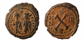 Phocas, with Leontia. 602-610. Æ Decanummium (bronze, 2.47 g, 17 mm). Theoupolis (Antioch) dated RY 2(?) (603/4). Phocas and Leontia standing facing, ...