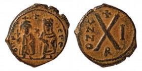Phocas, with Leontia. 602-610. Æ Decanummium (bronze, 2.71 g, 16 mm) Theoupolis (Antioch) dated RY 2(?) (603/4). Phocas and Leontia standing facing, h...