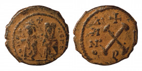 Phocas, with Leontia. 602-610. Æ Decanummium (bronze, 1.98 g, 17 mm). Theoupolis (Antioch) dated RY 2(?) (603/4). Phocas and Leontia standing facing, ...
