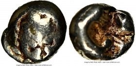 IONIA. Miletus. Ca. 600-550 BC. EL 1/24 stater or myshemihecte (6mm, 0.52 gm). NGC VG 4/5 - 4/5. Lion or panther head facing / Irregular incuse punch....
