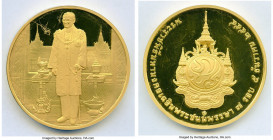 Rama IX gold Proof "84th Birthday of Rama IX" Medal BE 2554 (2011) Proof (Surface Hairlines, Scratches), Size 59.9mm. Weight 240gms. Edge marked "660"...