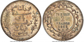 Muhammad al-Nasir Bey 2 Francs AH 1334 (1915)-A MS63 NGC, Paris mint, KM239. Lemon, blush and gray toned with resplendent luster. 

HID09801242017
...