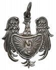 Orzełek Patriotyczny z Matką Boską Ostrobramską Orzełek wykonany prawdopodobnie w srebrze. Wymiary: 24,4 x 22,2 mm, waga 2,43 g.&nbsp; 