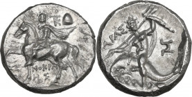 Greek Italy. Southern Apulia, Tarentum. AR Nomos, c. 215-212 BC. Xenokrates magistrate. Obv. Bearded strategos on horse walking left, wearing short tu...