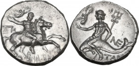 Greek Italy. Southern Apulia, Tarentum. AR Nomos, c. 240-228 BC. Kallikrates magistrate. Obv. Warrior, holding Nike, who crowns him, in extended right...
