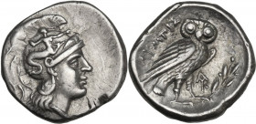 Greek Italy. Southern Apulia, Tarentum. AR Drachm, c. 240-228 BC, Olympis magistrate. Obv. Helmeted head of Athena right, helmet decorated with Skylla...