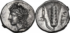 Greek Italy. Southern Lucania, Metapontum. AR Stater, c. 330-290 BC. Obv. Wreathed head of Demeter left. Rev. META. Seven-grained barley ear, leave to...