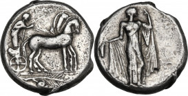 Sicily. Himera. AR Tetradrachm, c. 460 BC. Obv. Traces of legend ΠEΛOΨ. Pelops, with pointed beard, holding reins and goad, driving chariot, horses wa...