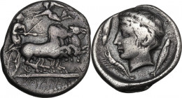Sicily. Katane. AR Drachm, c. 405-404 BC. Obv. Female charioteer, holding kentron and reins, driving fast quadriga right; above, Nike flying left, cro...