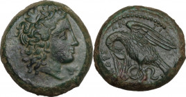 Sicily. Morgantina. AE 21 mm, c. 339/8-317 BC. Obv. Laureate head of Sikelia right; behind, Γ; before, monogram. Rev. ΜΟΡΓΑΝ/ΤΙΝΩΝ. Eagle with spread ...