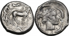 Sicily. Syracuse. Second Democracy (466-405 BC). AR Tetradrachm, c. 450 BC. Obv. Charioteer, holding kentron and reins, driving slow quadriga right; a...