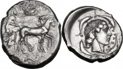 Sicily. Syracuse. Second Democracy (466-406 BC). AR Tetradrachm, c. 450-440 BC. Obv. Charioteer driving walking quadriga right, holding kentron and re...