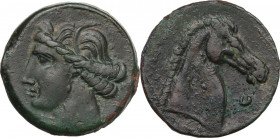 Punic Sardinia. Time of the First Punic War (c. 264-260 BC). AE 27.5 mm. c.264-241 BC. Obv. Head of Tanit left, wearing wreath of grain ears and earri...