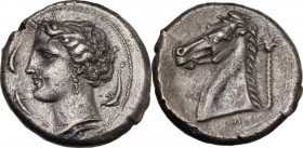 Africa. The Carthaginians in Sicily and North Africa. AR Tetradrachm, c. 320-300. Obv. Head of Tanit (Kore-Persephone) left, wearing barley wreath, ea...