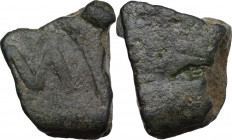 Aes Premonetale. Aes Formatum. Fragment of a bronze ingot. Latium, 6th-4th century BC. Obv. Large M within shallow semicircular incuse. Rev. Plain, sm...