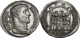 Maximianus (286-310). AR Argenteus. Siscia mint, 295 AD. Obv. MAXIMIANVS AVG. Laureate head right. Rev. VICTORIA AVGG. The four princes sacrificing ov...