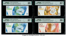 Aruba Centrale Bank 10 (2); 25; 50 Florin 1990; 1993 (2); 2008 Pick 7; 11; 12; 18b Four Examples PMG Superb Gem Unc 68 EPQ; Superb Gem Unc 67 EPQ (2);...