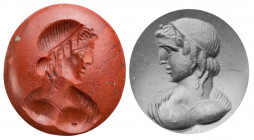 GEMMEN UND SIEGELSTEINE
 Intaglio Jaspis, rot, opak, hochoval, leicht konvexe Oberseite, flache Unterseite, mit der Darstellung der Büste des Apollo ...
