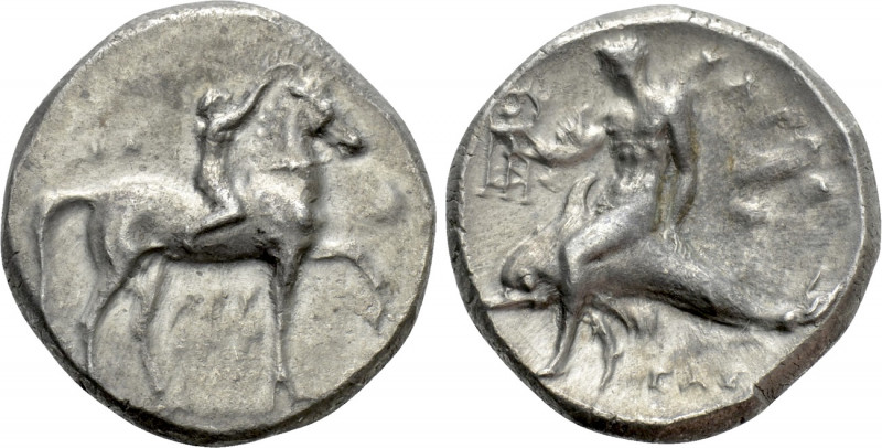 CALABRIA. Tarentum. Nomos (Circa 280 BC). 

Obv: Crowning youth on horse stand...