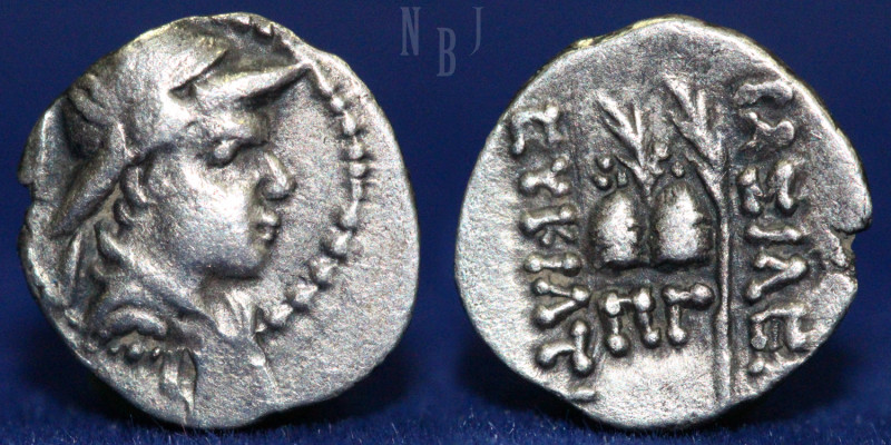Bactria, Eucratides I. 171-135 B.C. AR Obol, (0.45gm, 10mm) Helmeted head Rv. Ca...