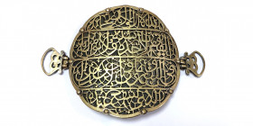 A SAFAVID STYLE imitation CALLIGRAPHIC PIERCED STEEL BELT BUCKLE. four lines of inscription in naskh.