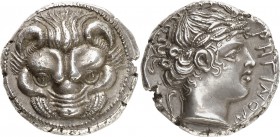 GRÈCE ANTIQUE
Bruttium, Rhégium (415-387 av. J.C.). Tétradrachme argent.
Av. Tête de lion de face dans un cercle de grènetis. Rv. RHGINON Tête lauré...