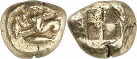 GRÈCE ANTIQUE
Mysie, Cyzique (460-400 av. J.C.). Statère d’électrum.
Av. Triton à gauche tenant un thon dans sa main droite, un thon au dessous. Rv....